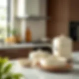 Elegant cream-colored cookware set displayed in a modern kitchen setting