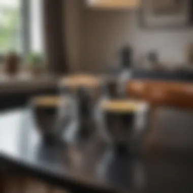 A stylish arrangement of three-legged cups on a dining table.